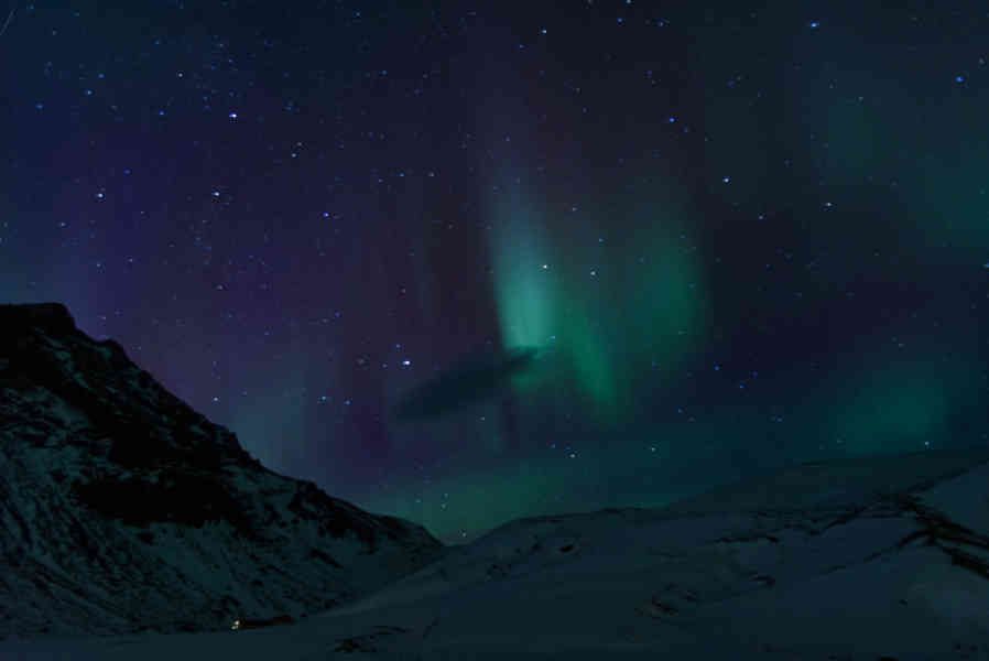 Islandia 112 - Aurora Boreal - catarata de Skógafoss.jpg
